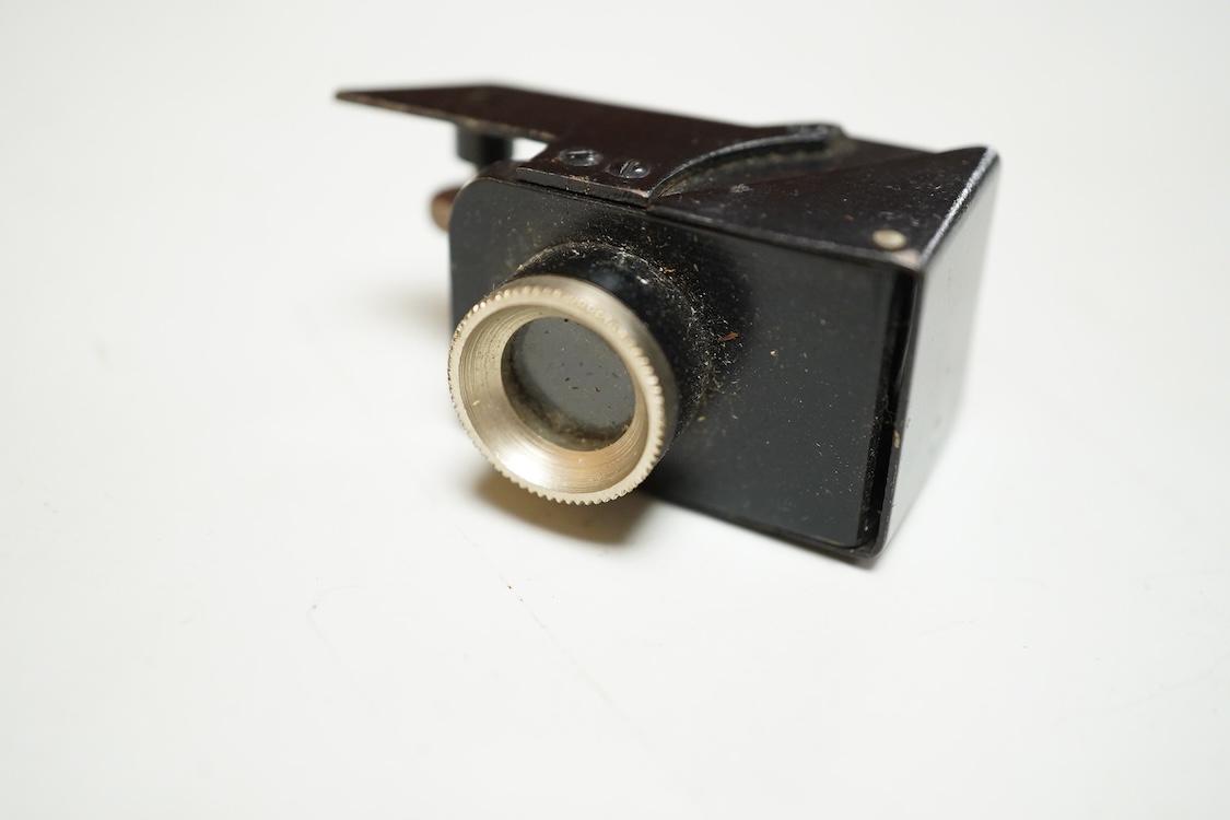 A Pathescope Moto camera 9.5mm cine camera in a brown leather case